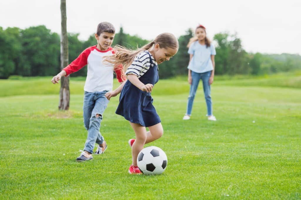 Image of kids playing soccer