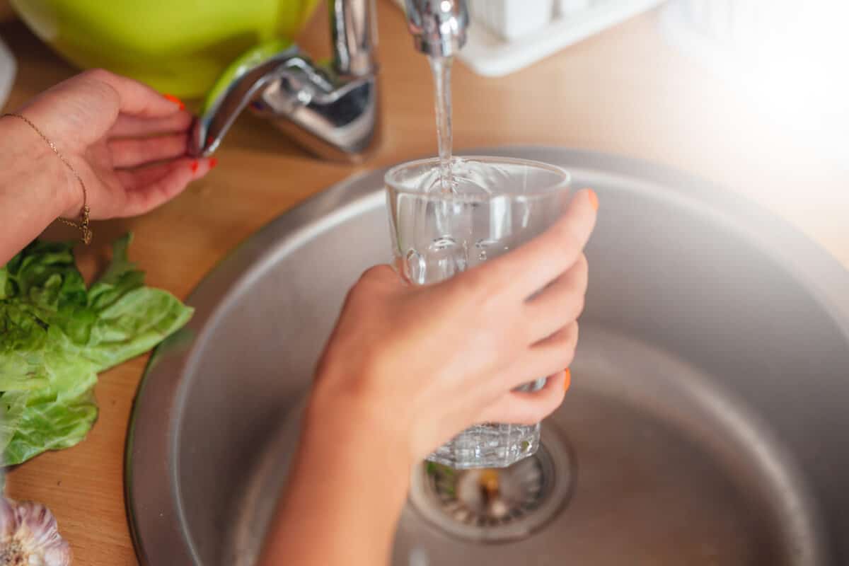 hydration filling up a glass from tap