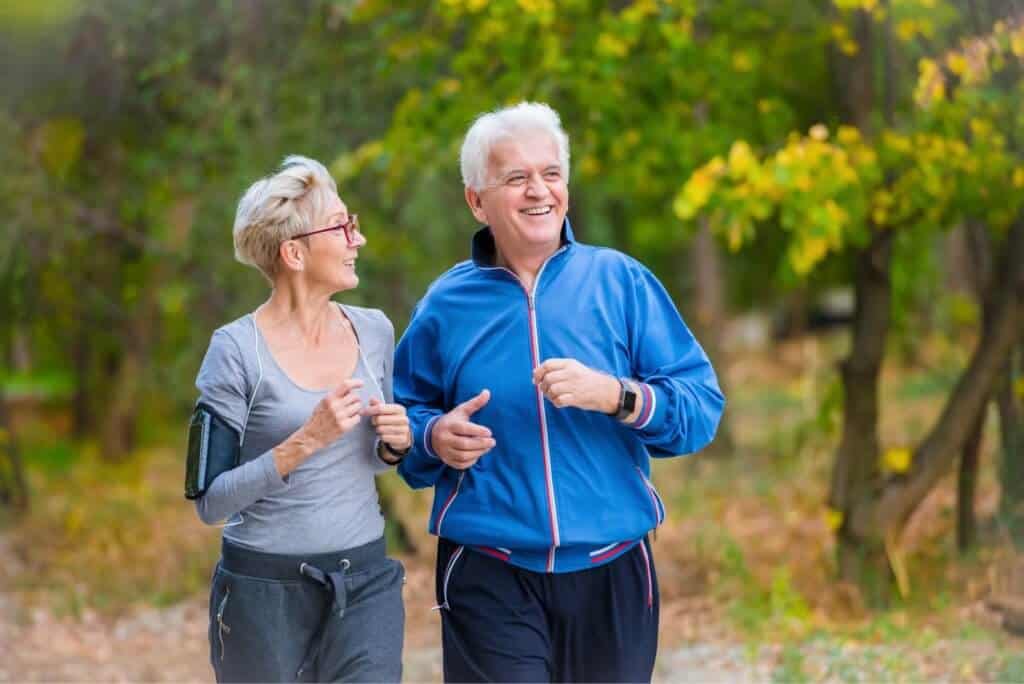 a senior couple jogging