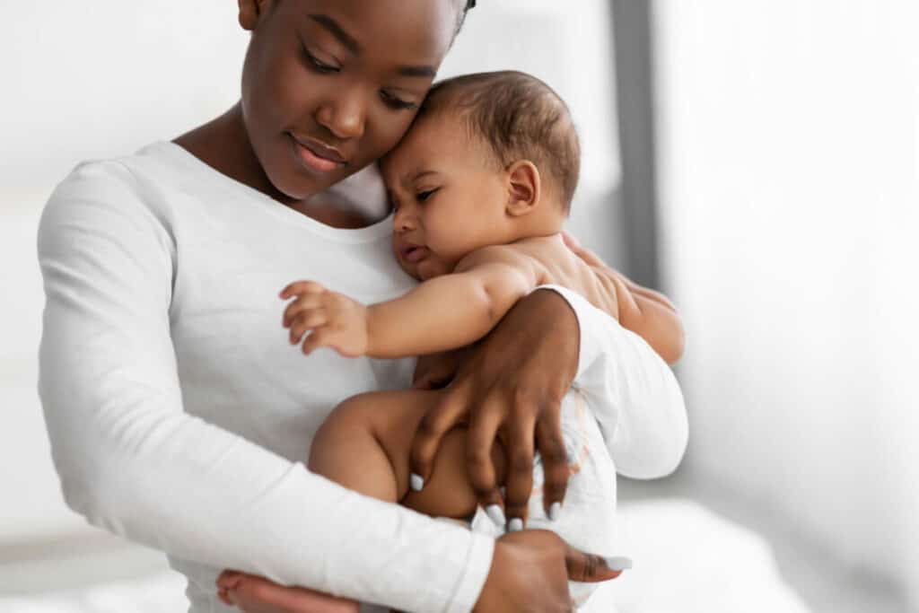 woman holding a baby