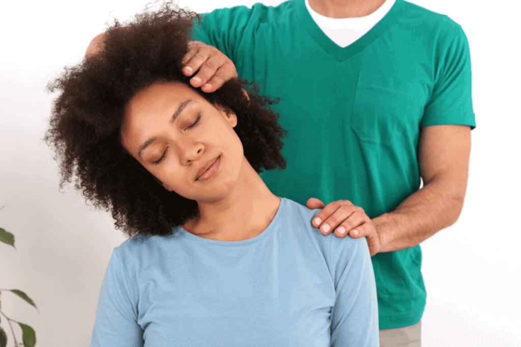 chiropractor working on patient's neck