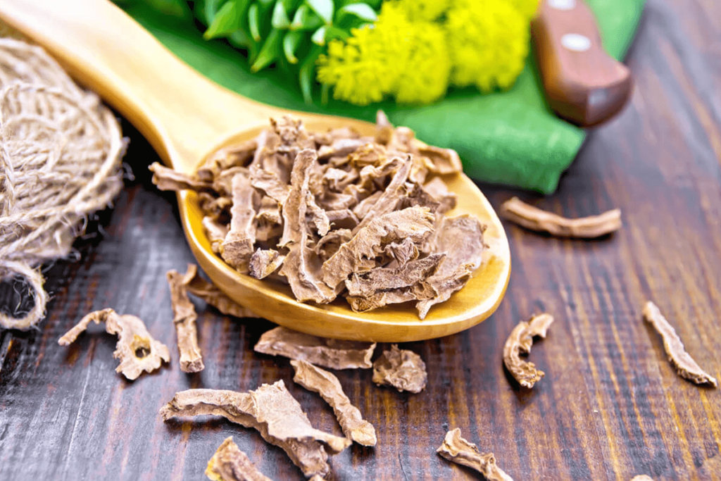 dried rhodiola herb on a canvas background with flowers