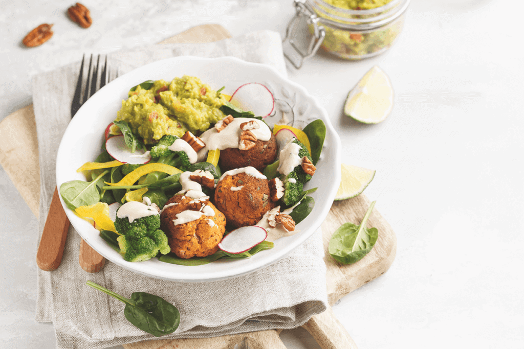 vegan salad with greens and falafel